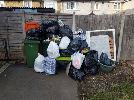 Home clearance team sorting items in a Plaistow residence