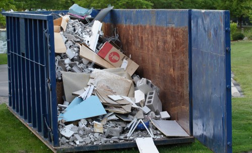 Professionals sorting garage items