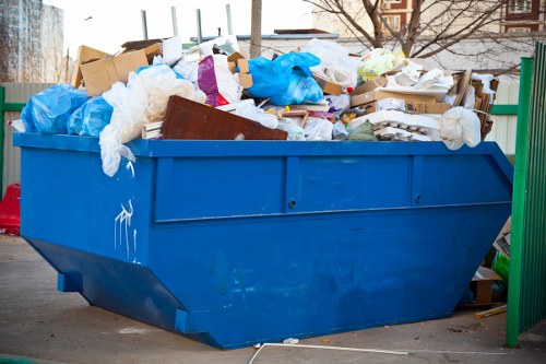 Waste collection truck servicing Plaistow residential area