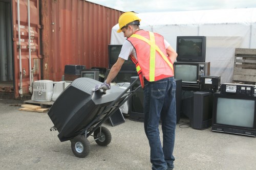 Vehicle used for rubbish collection parked for safe loading